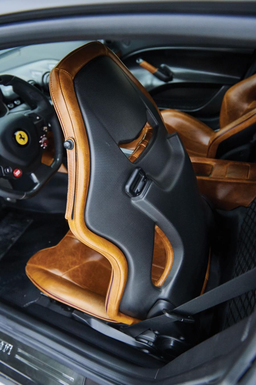 Интерьер Ferrari F12tdf Tailor Made 2017 года  (фото 41 из 42)